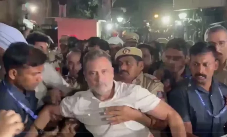 High-voltage drama in Delhi: Rahul Gandhi climbed a barricade; police detained him late at night.